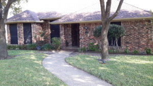 Senior home with landscaped exterior in Richardson TX